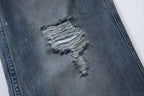 Ripped Fade Denim Jeans