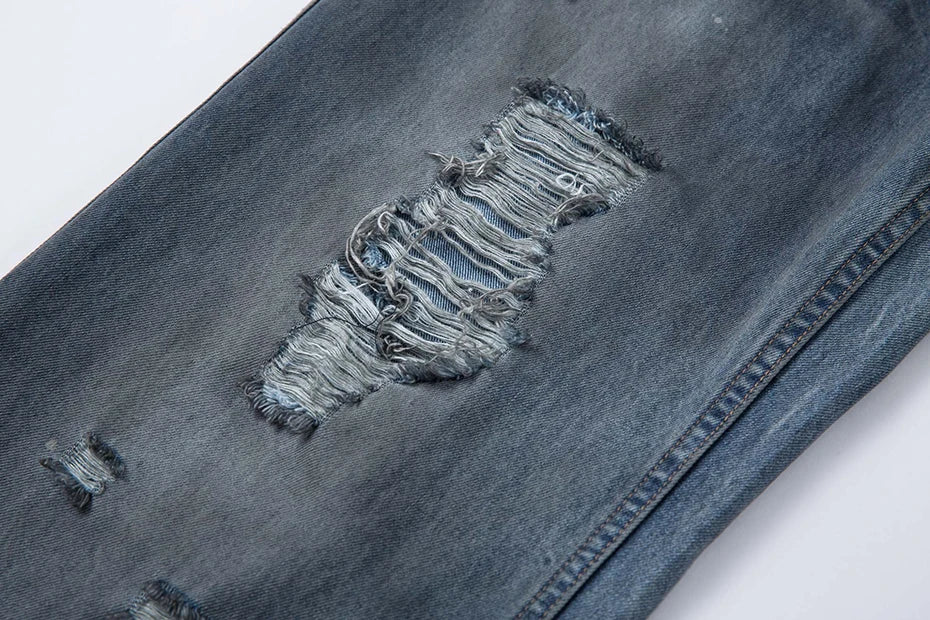 Ripped Fade Denim Jeans