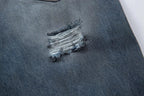 Ripped Fade Denim Jeans